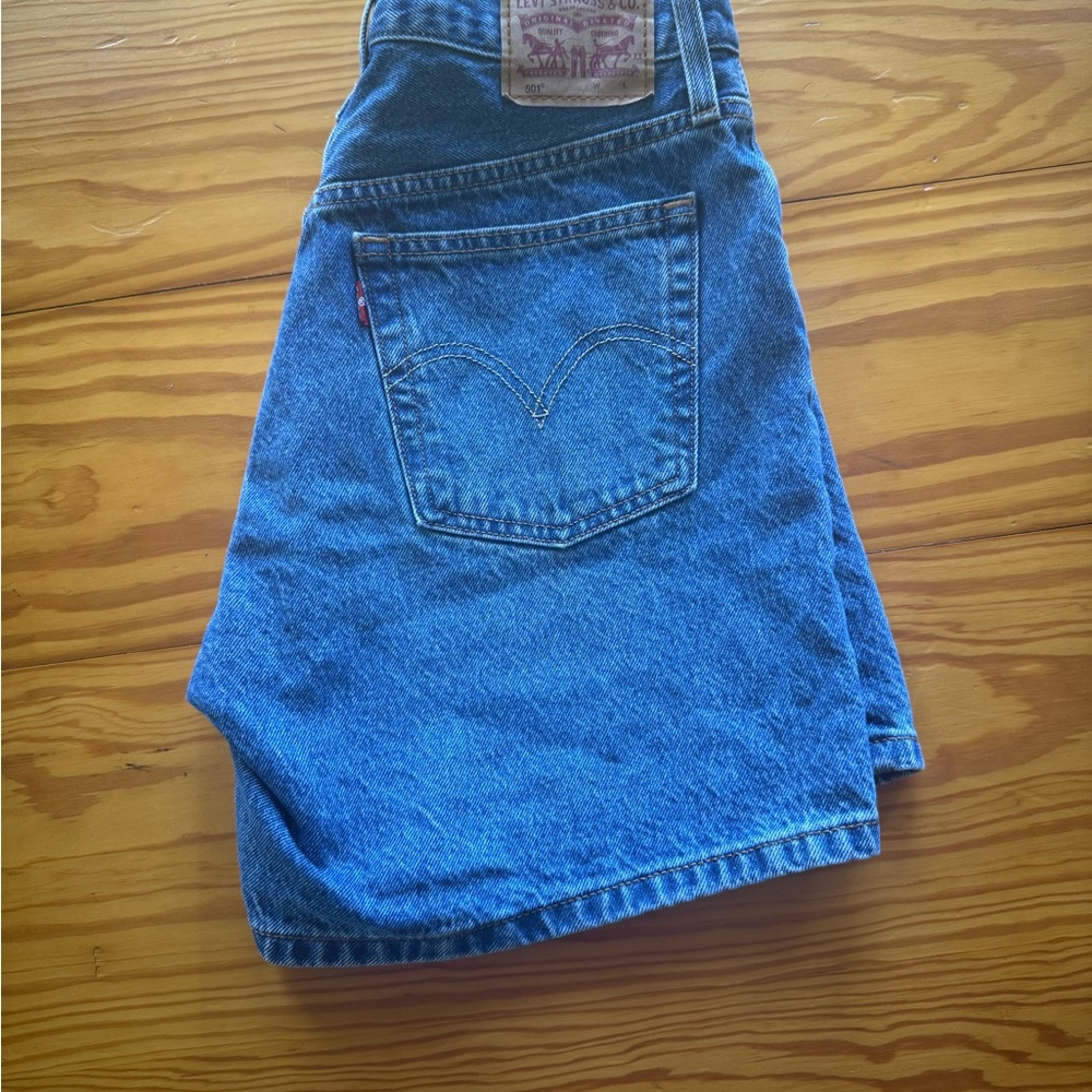 LEVI’s Blue Denim high wasted mom shorts.
